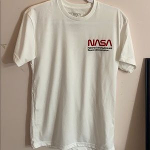 White T Shirt with “NASA” in red lettering.